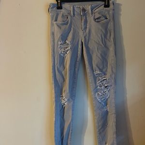 American Eagle women’s super super stretch X Distressed Grey Gray jegging size 2